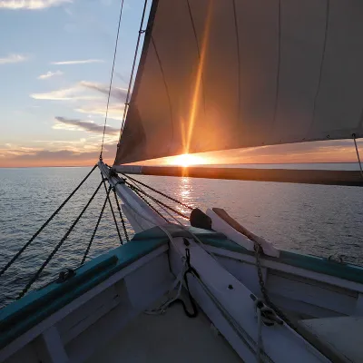 a boat is docked next to a body of water