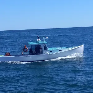 a small boat in a body of water